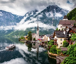 Austria, Hallstatt, Budynki, Jezioro Hallstättersee, Chmury, Góry