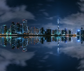 Miasto nocą, Dubaj, Zjednoczone Emiraty Arabskie, Odbicie, Zatoka, Wieżowce, Woda, Dzielnica Business Bay
