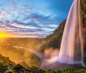 Promienie słońca, Wodospad Seljalandsfoss,  Islandia, Skały