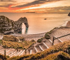 Łuk wapienny, Plaża, Schody, Anglia, Zachód słońca, Wybrzeże Jurajskie, Durdle Door, Morze, Skały