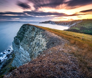 Klif, Zachód słońca, Gad Cliff, Wybrzeże, Anglia, Chmury, Trawy, Hrabstwo Dorset, Morze