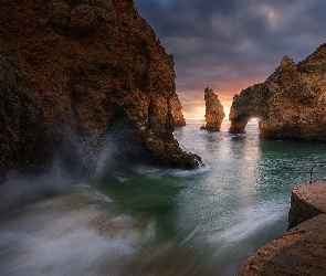 Skały, Portugalia, Cypel Ponta da Piedade, Zachód słońca, Morze