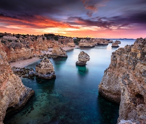 Region Algarve, Ocean Atlantycki, Skały, Portugalia, Morze, Wybrzeże, Zachód słońca