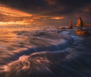 Nowa Zelandia, Taranaki, Zachód słońca, Morze, Skały, Three Sisters Beach