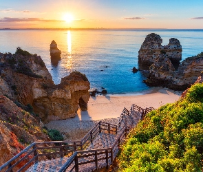 Portugalia, Camilo Beach, Plaża, Lagos, Schody, Skały, Zachód słońca, Wybrzeże, Morze, Algarve