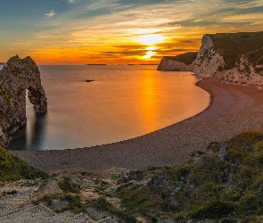 Anglia, Durdle Door, Skały, Zachód słońca, Łuk, Plaża, Hrabstwo Dorset, Wybrzeże Jurajskie, Morze