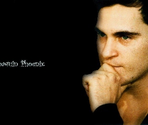 Joaquin Phoenix, ręka, niebieskie oczy