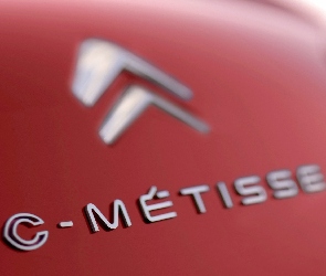 Emblemat, C-Metisse